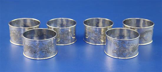 A set of six Chinese? silver napkin rings, 3.5 oz.